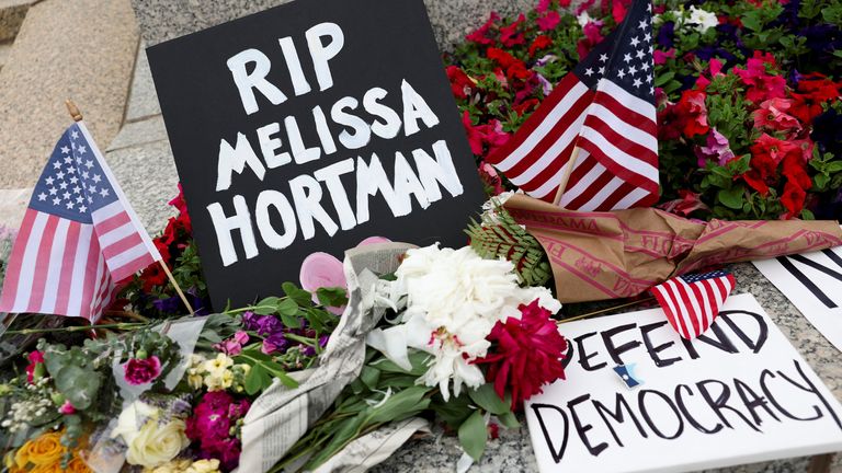 A small memorial for senior Democratic state assemblywoman Melissa Hortman and her husband Marc, who were fatally shot, is displayed outside